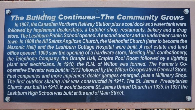 The Building Continues  The Community Grows Marker image. Click for full size.