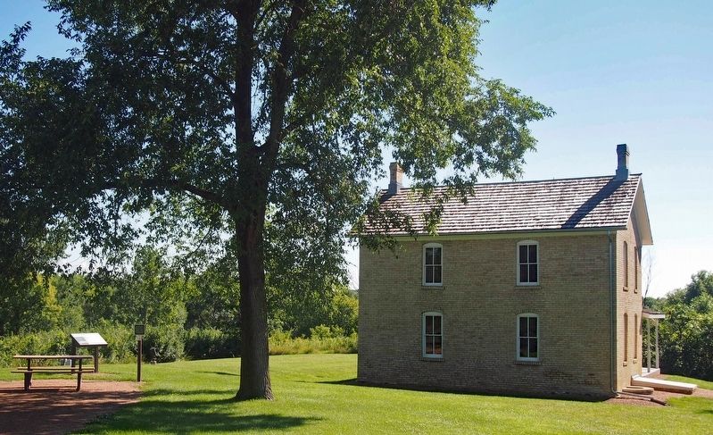 Marker behind the historic Wendelin Grimm Farmhouse image. Click for full size.