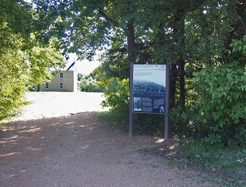 Marker on the path to the historic Grimm Farmhouse image. Click for full size.