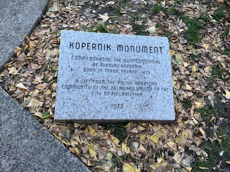 Dedication plaque at the base of the sculpture image. Click for full size.