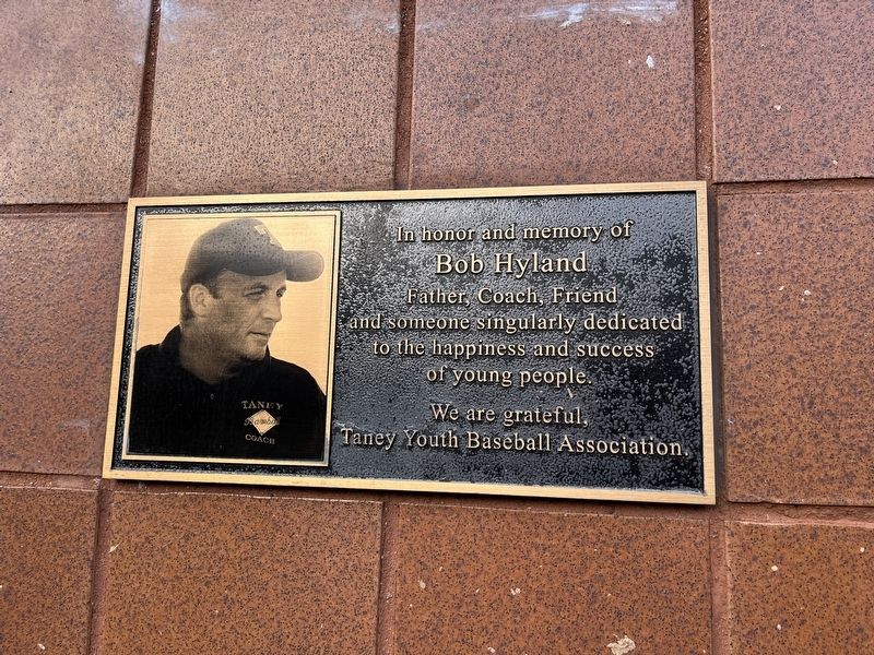 Dedication plaque immediately below the memorial image. Click for full size.