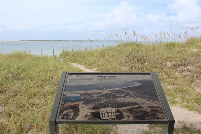 Our Dilemma: Eroding Shore Marker. Click for full size. Our Dilemma: Eroding Shore Marker image. Click for full size.