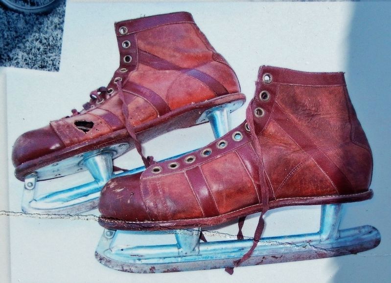 Marker detail: Ice skates found in DeYoung house image. Click for full size.