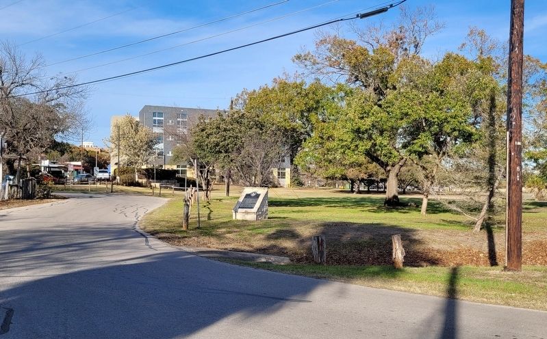 The view of the Acequia de Arriba Marker from the street. Click for full size. The view of the Acequia de Arriba Marker from the street image. Click for full size.