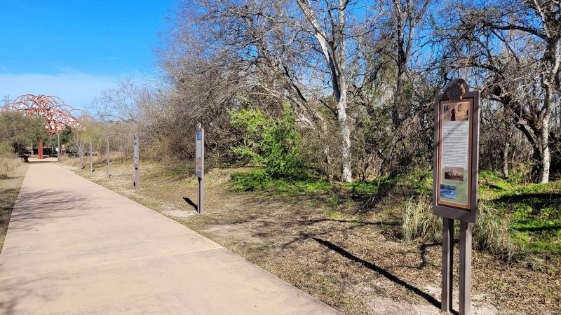 The view of the Mission Espada: The Restoration Period Marker along the River Walk image. Click for full size.