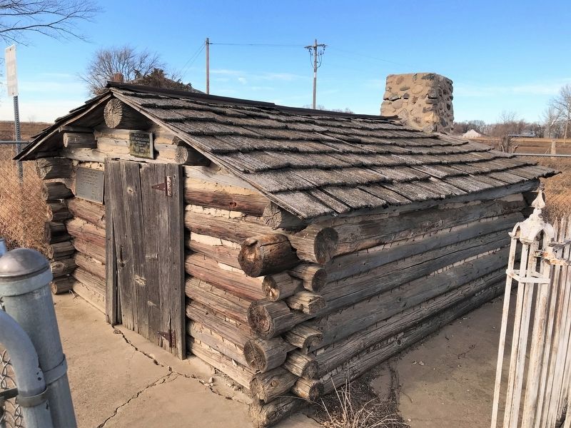 Replica First Schoolhouse image. Click for full size.