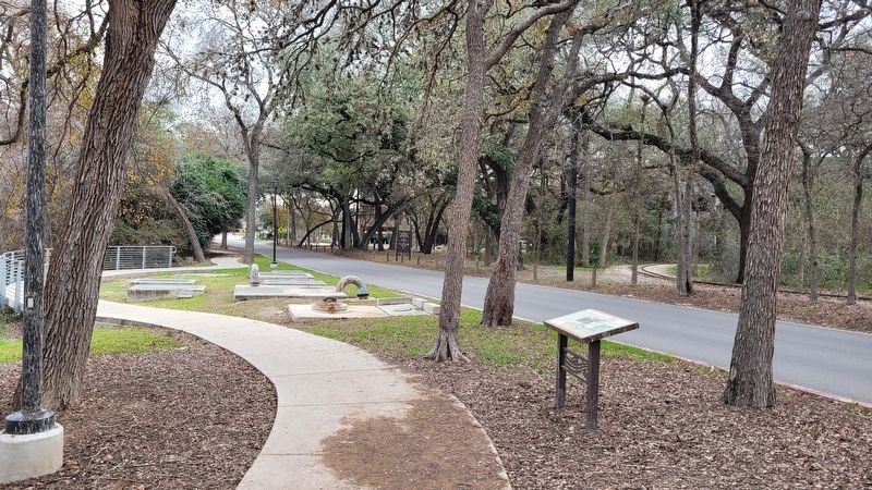 The view of the Brackenridge Park Since 1899 Marker from the walkway image. Click for full size.
