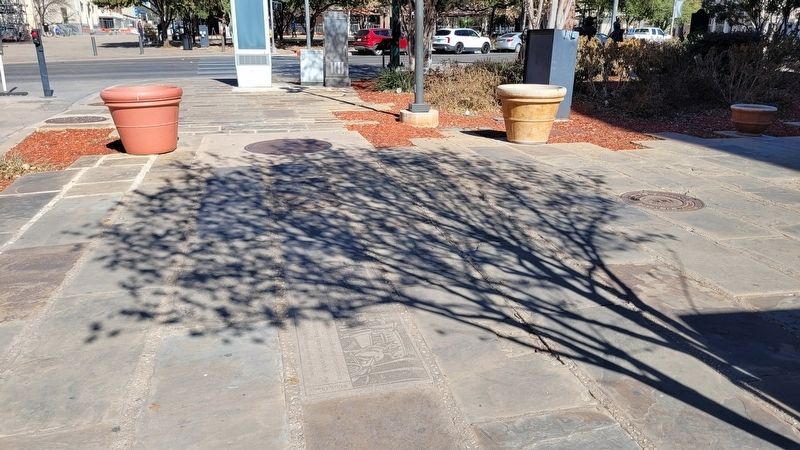 The "Save the Plaza" Marker laying on the ground near the courthouse image. Click for full size.