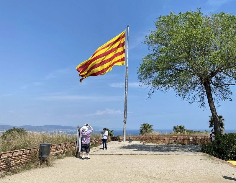 Catalan Flag raised Marker - wider view image. Click for full size.
