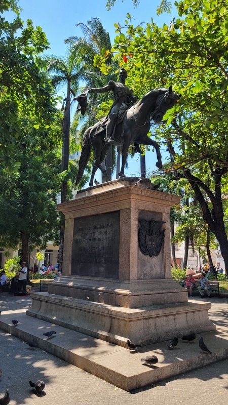 The front view of the Simón Bolívar Monument from the park. Click for full size. The front view of the Simón Bolívar Monument from the park image. Click for full size.