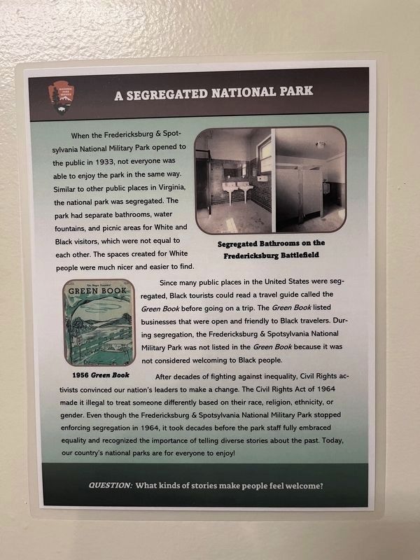 Signage in the men's room shares additional information about the Jim Crow era in the park. image. Click for full size.