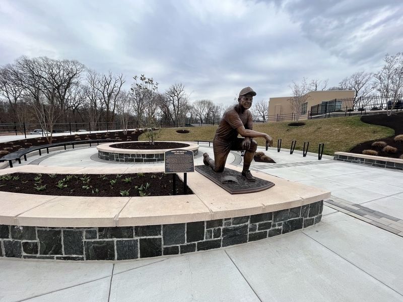 Dominic "Dim" Montero '38 Marker and statue image. Click for full size.