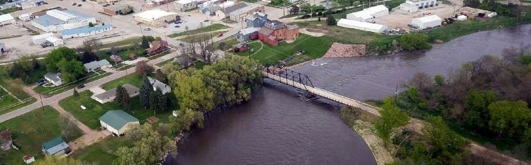 "Neligh's Mill Bridge Weathers The Rising Elkhorn River" after being repaired. Click for more information. "Neligh's Mill Bridge Weathers The Rising Elkhorn River" after being repaired image. Click for more information.
