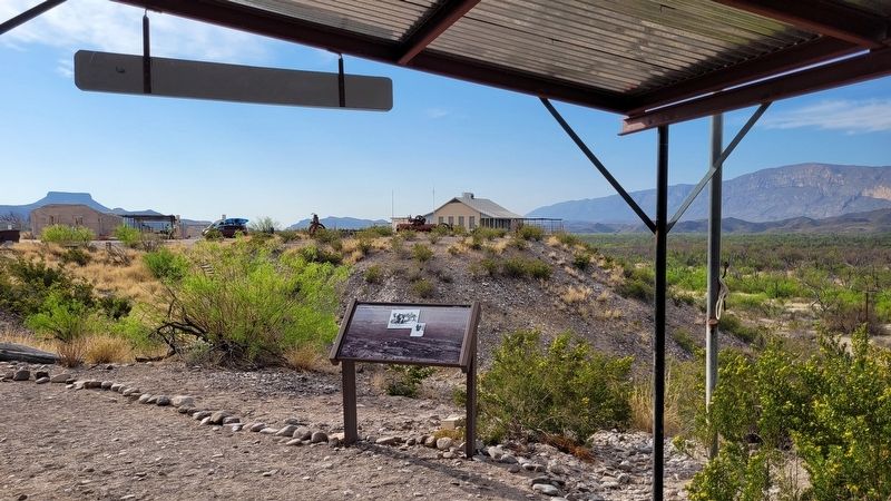 The view of the Cavalry Post to Trading Post Marker from under the patio of the Garlick House. Click for full size. The view of the Cavalry Post to Trading Post Marker from under the patio of the Garlick House image. Click for full size.