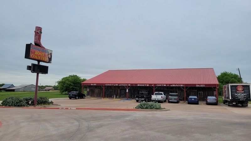 The view from the street of the boot store with the marker on the porch. Click for full size. The view from the street of the boot store with the marker on the porch image. Click for full size.