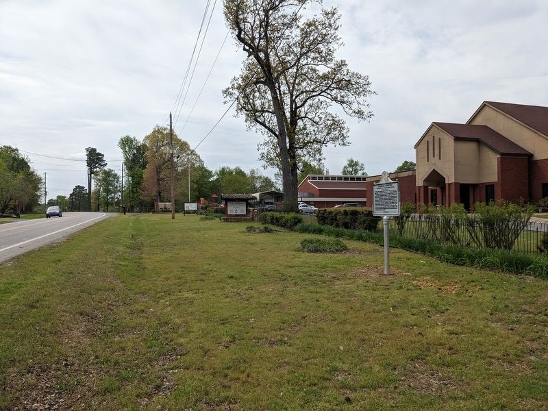 Position of the marker in relation to the road and Primrose UMC when heading west on Dixon Road image. Click for full size.