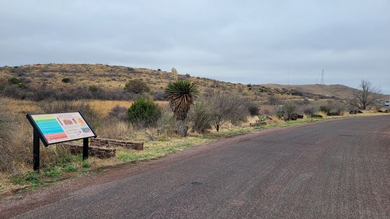 The view of the Early Human Habitation Marker from the road side park. Click for full size. The view of the Early Human Habitation Marker from the road side park image. Click for full size.