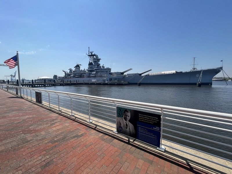 Paul Robeson Marker with the USS <i>New Jersey</i> visible in the background. Click for full size. Paul Robeson Marker with the USS <i>New Jersey</i> visible in the background image. Click for full size.