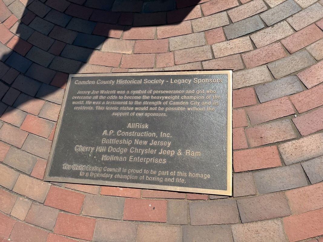 Jersey Joe Walcott plaque on the ground in front of the marker. Click for full size. Jersey Joe Walcott plaque on the ground in front of the marker image. Click for full size.