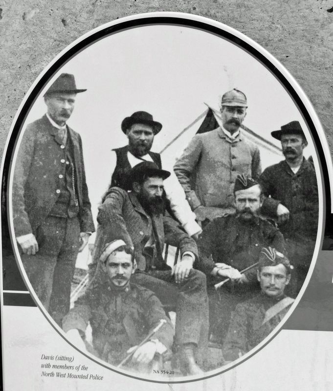 Marker detail: Davis (sitting) with members of the North West Mounted Police. Click for full size. Marker detail: Davis (sitting) with members of the North West Mounted Police image. Click for full size.