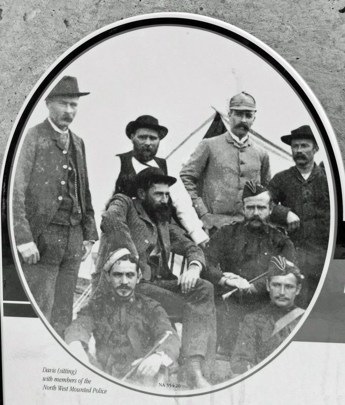 Marker detail: Davis (sitting) with members of the North West Mounted Police image. Click for full size.