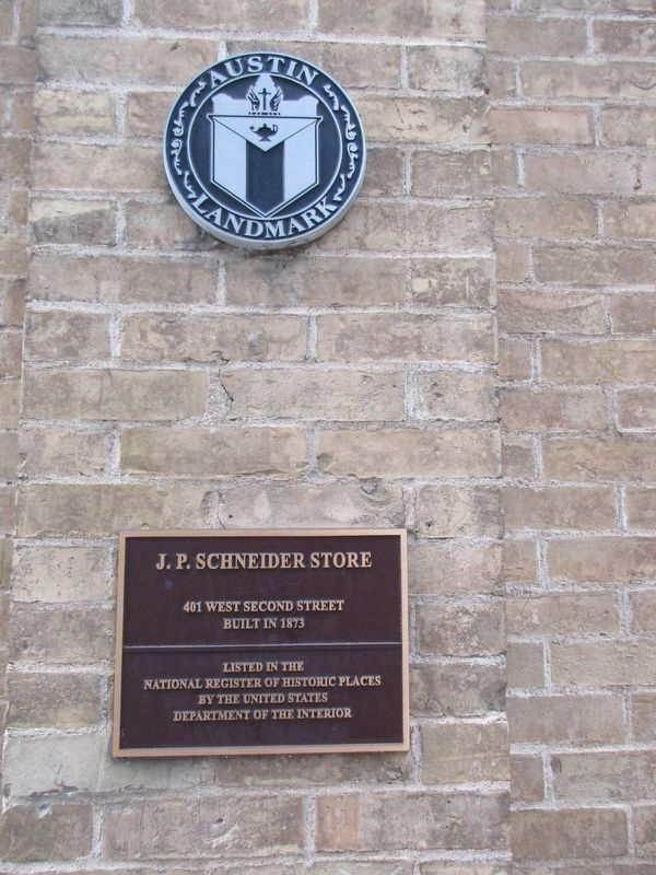 J.P. Schneider Store National Register of Historical Places and Austin Landmark Tablets. Click for full size. J.P. Schneider Store National Register of Historical Places and Austin Landmark Tablets image. Click for full size.