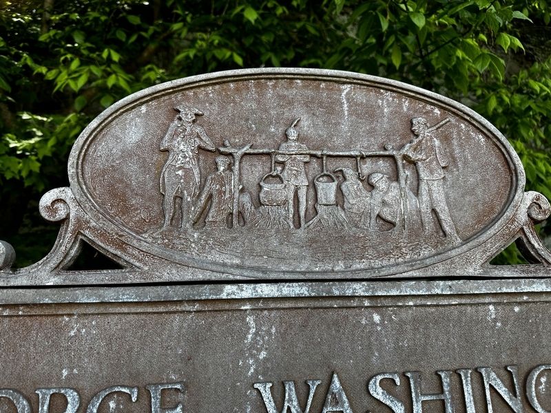 Close-up of the medallion at the top of the marker image. Click for full size.
