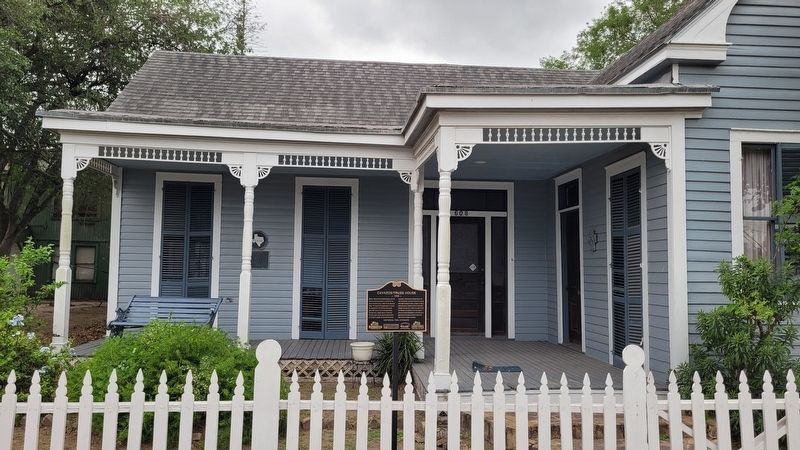 The Cavazos House Marker is located on the front wall of the house. Click for full size. The Cavazos House Marker is located on the front wall of the house image. Click for full size.