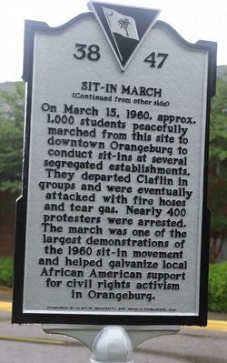 Sit-in March side of marker image. Click for full size.