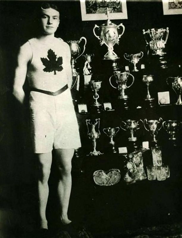 Robert “Bobby” Kerr with sprinting prizes ca 1908. Click for full size. Robert “Bobby” Kerr with sprinting prizes ca 1908 image. Click for full size.