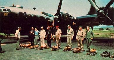 An RB-29 reconnaissance crew assigned to the 91st SRS lines up for a preflight inspection image. Click for full size.