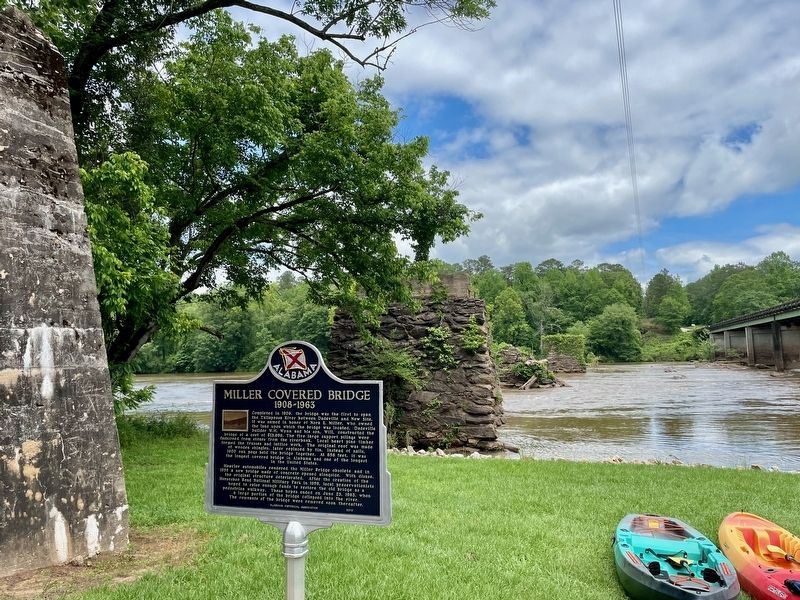 Miller Covered Bridge Marker and support pilings across Tallapoosa River. image. Click for full size.
