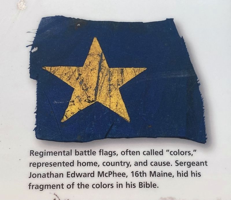 Fragment of the colors of the 16th Maine. Click for full size. Fragment of the colors of the 16th Maine image. Click for full size.