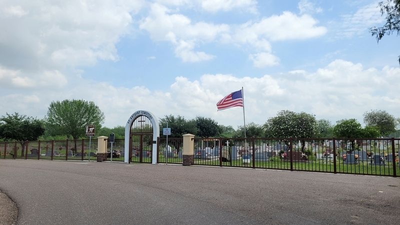The view of the cemetery and the Peitas Cemetery Marker from the street image. Click for full size.