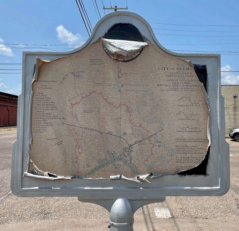 Reverse side of marker showing weathering of foil period map. image. Click for full size.