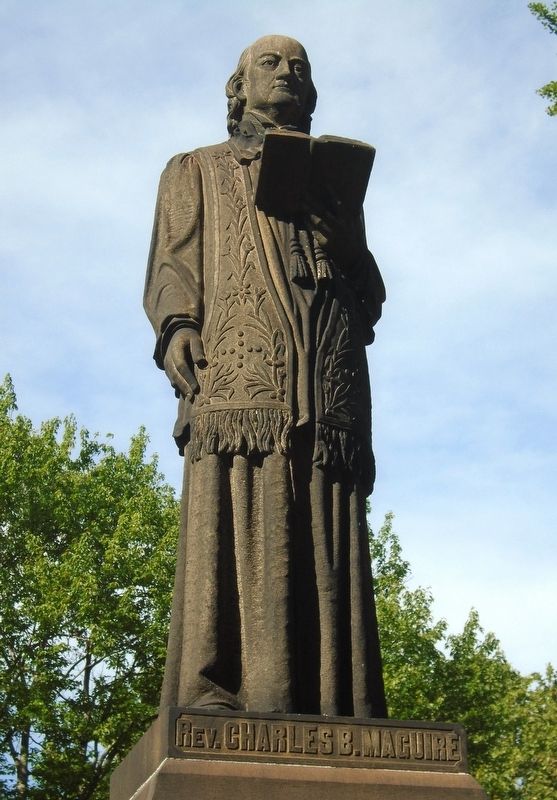 Rev. Charles B. Maguire Statue image. Click for full size.