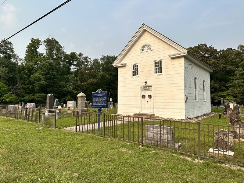 Sand Hill Church Marker with church in background. Click for full size. Sand Hill Church Marker with church in background image. Click for full size.