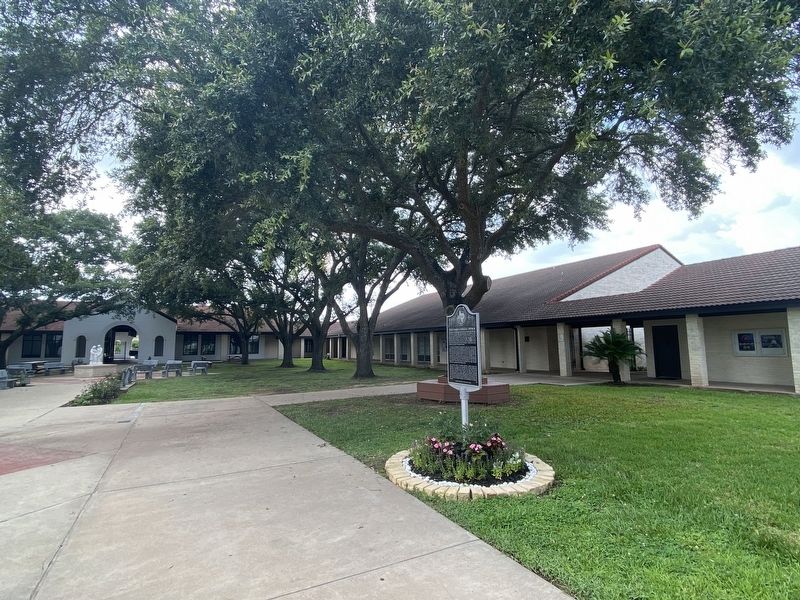 Holy Family Catholic Church Marker is located in an interior courtyard of the church. image. Click for full size.