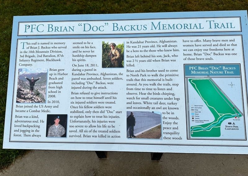 PFC Brian "Doc" Backus Memorial Trail Marker image. Click for full size.