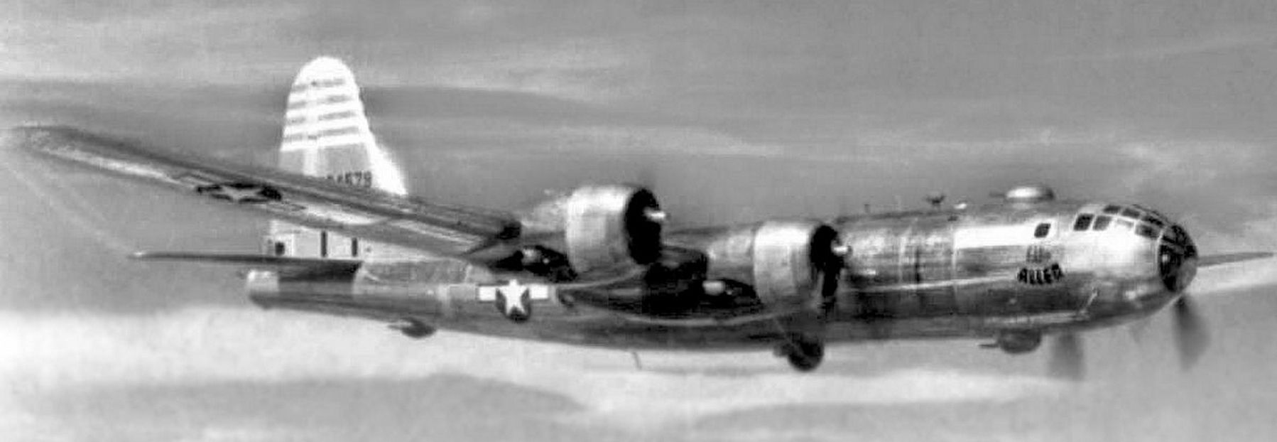 B-29 "Eddie Allen" of the 40th Bomb Group during a mission against rail yards in Rangoon, Burma. image. Click for full size.
