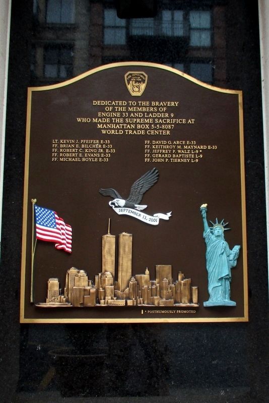 Engine 33 and Ladder 9 plaque image. Click for full size.