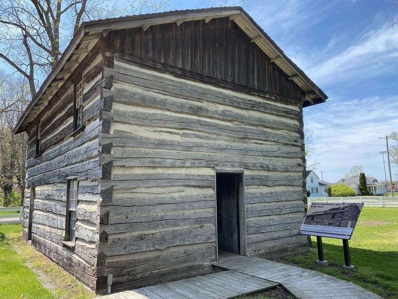 Log by Log History was Made Here Marker and Cabin. Click for full size. Log by Log History was Made Here Marker and Cabin image. Click for full size.