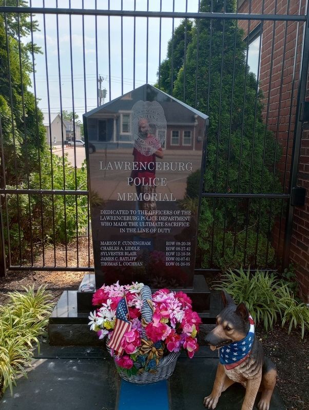 The Lawrenceburg Police Memorial stands nearby. Click for full size. The Lawrenceburg Police Memorial stands nearby image. Click for full size.