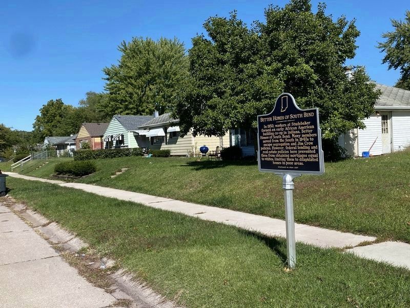 Marker in front of homes on east side of N Elmer St image. Click for full size.