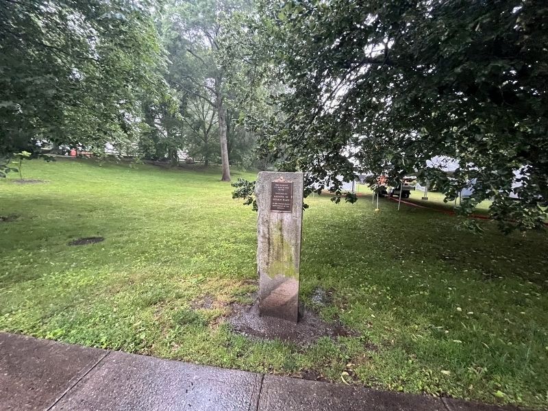 A National Register of Historic Places plaque stands on the park grounds. Click for full size. A National Register of Historic Places plaque stands on the park grounds image. Click for full size.