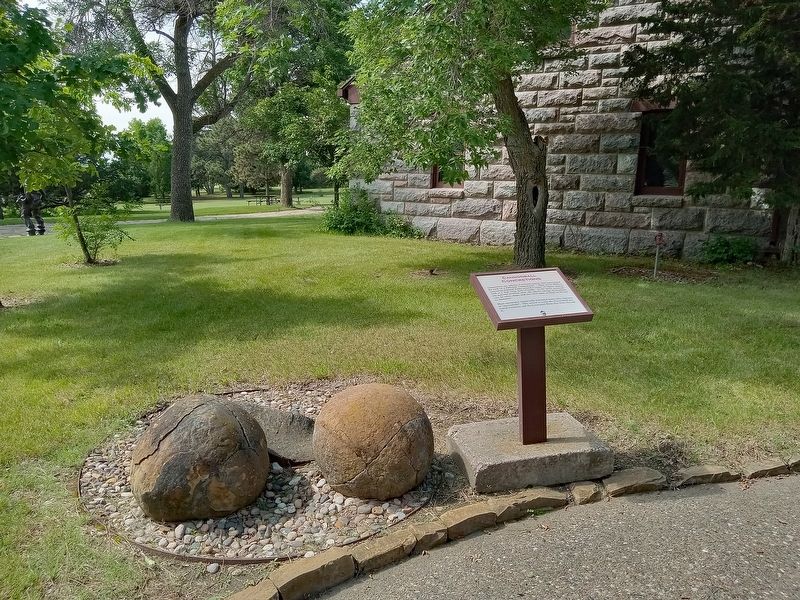 Marker and concretions behind the Fort Abraham Lincoln State Park visitor center image. Click for full size.