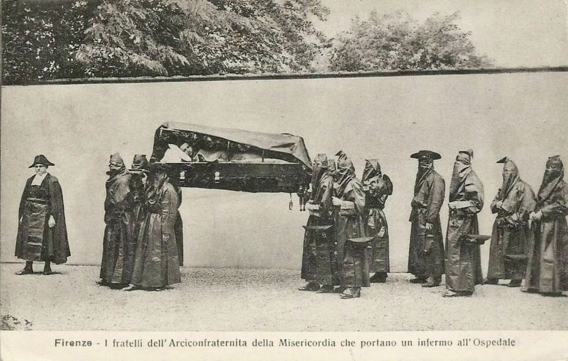 Members carrying a sick person to the hospital. Click for full size. Members carrying a sick person to the hospital image. Click for full size.