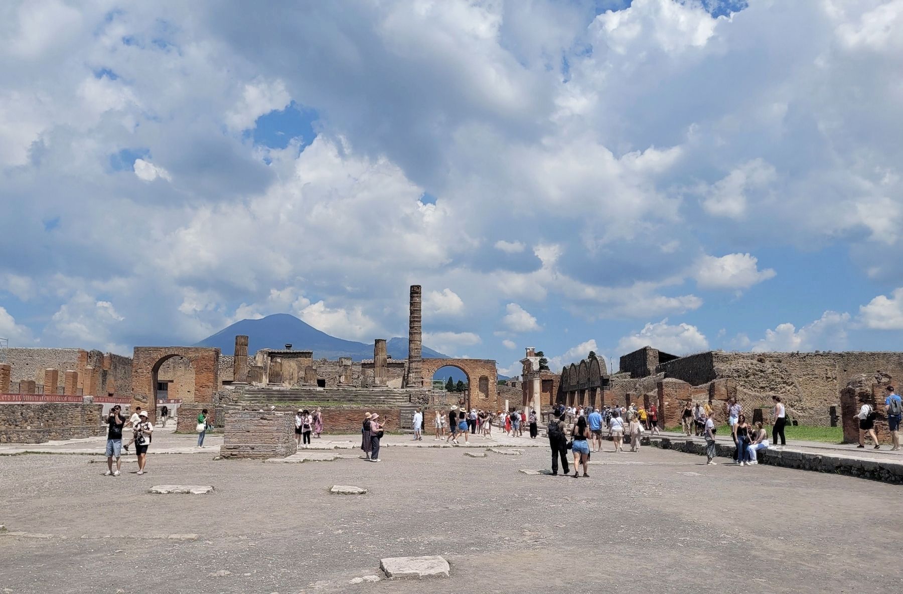The view of the main Forum with Mt. Vesuvius in the background. Click for full size. The view of the main Forum with Mt. Vesuvius in the background image. Click for full size.