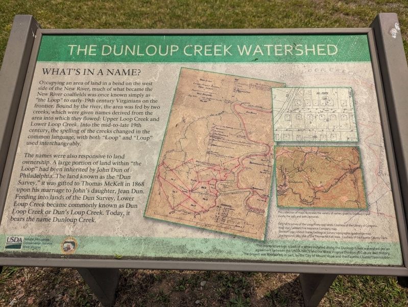The Dunloup Creek Watershed Marker. Click for full size. The Dunloup Creek Watershed Marker image. Click for full size.