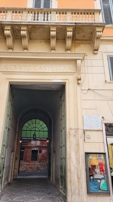 The Sandro Pertini Marker next to the entrance to the building image. Click for full size.